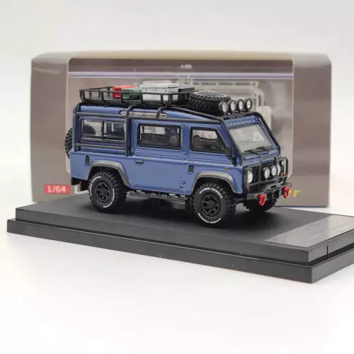 1:64 diecast Land Rover Defender van toy car, blue with roof details and front grille