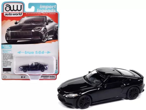 Black 1/64 diecast model car in package, front three-quarter view