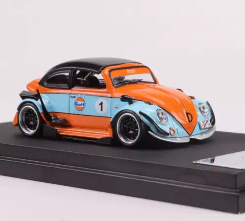 Orange and blue Gulf livery VW Beetle diecast metal sports car on black display base