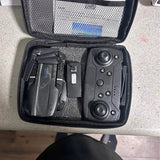 Longview TX drone remote and folded drone in zippered carry case