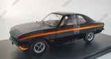 Whitebox 1:24 diecast model car, black with orange racing stripes, front three-quarter view