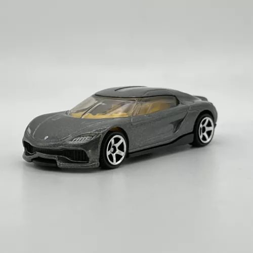 Metalflake grey diecast car, front 3/4 view with black details and silver wheels