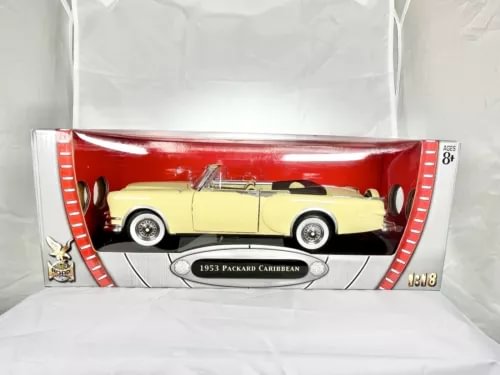 Yellow diecast 1:18 Packard Caribbean convertible model in display case