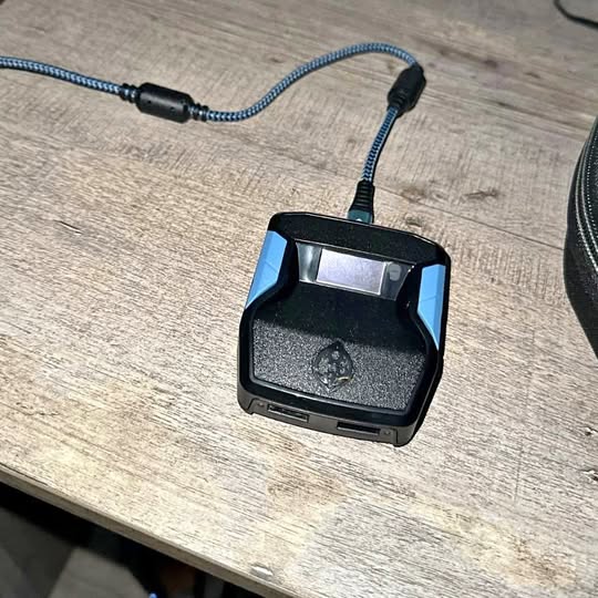 Cronus Zen Orlando FL Drone docking module with black base and connected cable