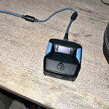 Cronus Zen Orlando FL Drone docking module with black base and connected cable