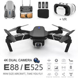 Foldable quadcopter drone with front camera, compact gray and black design