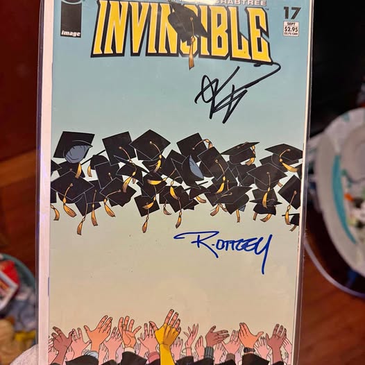 Invincible issue 17 comic book cover with autographs
