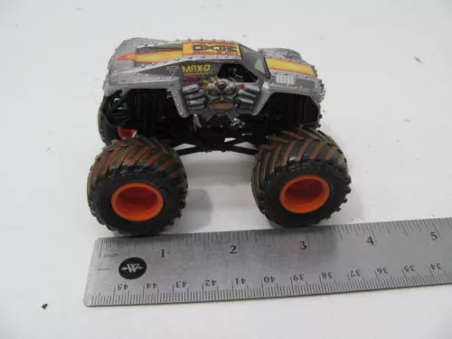 1:64 muddy die-cast monster truck, gray body, oversized black wheels, front