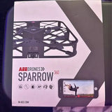 Drone retail package showing AEE Sparrow 360 drone and remote phone display