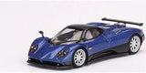 Blue sports car diecast model with black aero details and white-spoke wheels