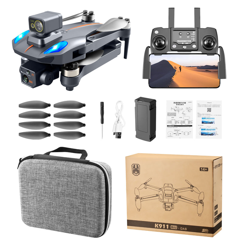 Gray quadcopter drone with dual cameras, remote controller, spare props, battery and manuals kit