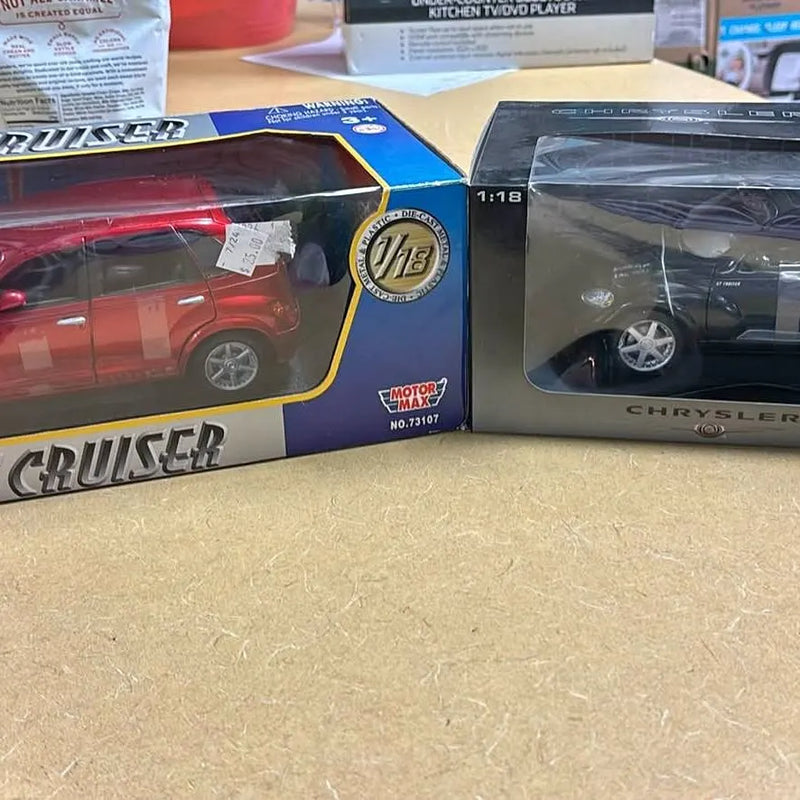 Chrysler Cruiser GT diecast car in window box, red model with blue trim