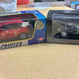 Chrysler Cruiser GT diecast car in window box, red model with blue trim