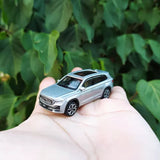 1/64 Geely Xingyue-L SUV diecast model car in silver, front view