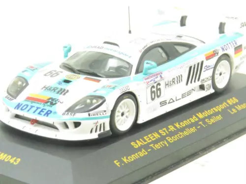 Diecast race car model, white and blue Saleen S7-R #66 on gray display base