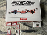 Drone racer ready-to-fly set box with drone and accessory parts