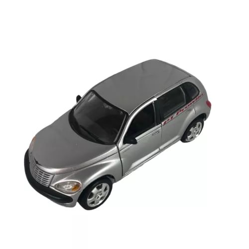 Silver 1/24 diecast car model with detailed grille and open cabin windows