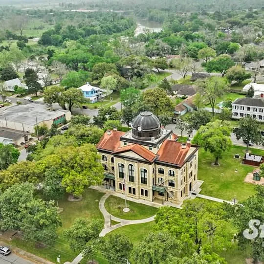 Drone aerial map showing a building with domed roof and surrounding houses