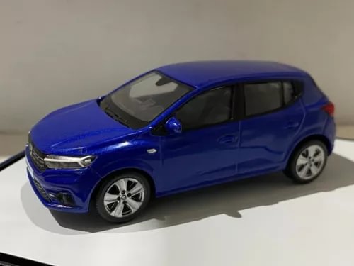 Blue diecast model car, front three-quarter view with silver wheels