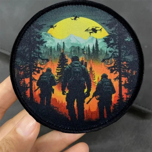 Circular tactical morale patch, hook-and-loop, forest and soldier silhouette emblem