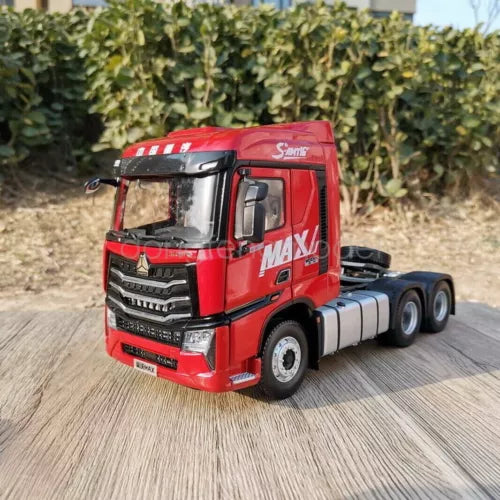 1/24 scale red tractor truck diecast model with black grille and silver wheels