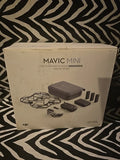 DJI Mavic Mini Fly More Combo box with accessories and spare batteries