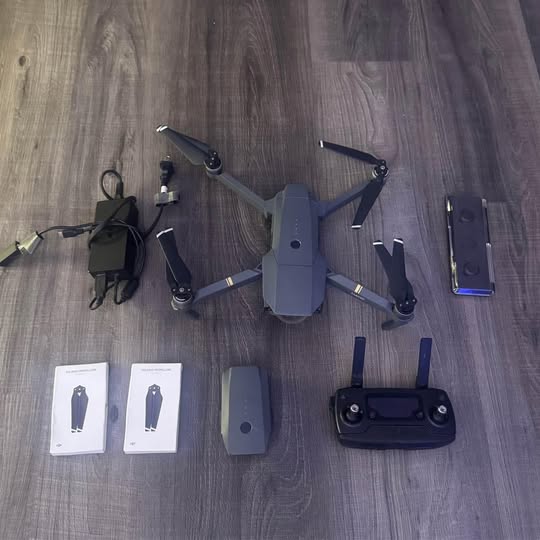 DJI Mavic Pro drone kit: grey quadcopter, remote controller, batteries, accessories