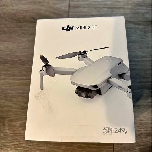DJI Mini 2 SE drone retail box with printed drone and specs on front
