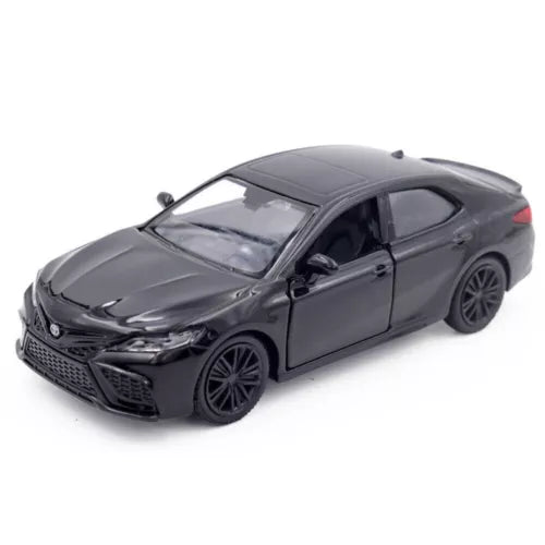 Dark gray diecast sedan model car, front 3/4 view with detailed headlights and wheels