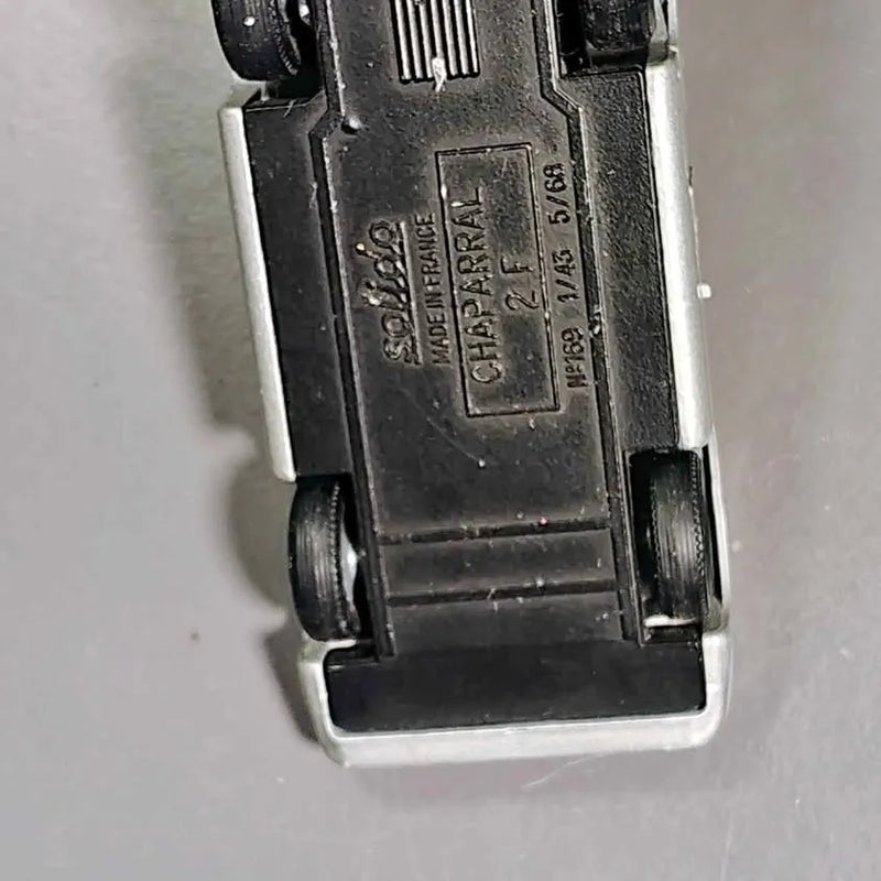 Diecast race car model base with printed brand and number plate detail