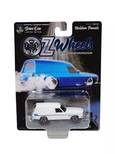 White diecast panel van model in blister pack on black card