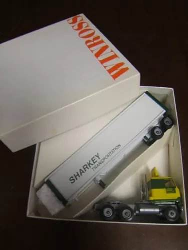 Winross Sharkey Transportation 1/64 diecast tractor trailer in packaging, open box view