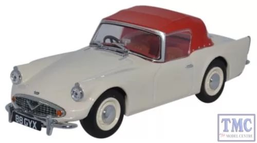 Ivory and red diecast car model with grille, front view