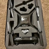 Potensic drone with four foldable propellers in a foam carrying case