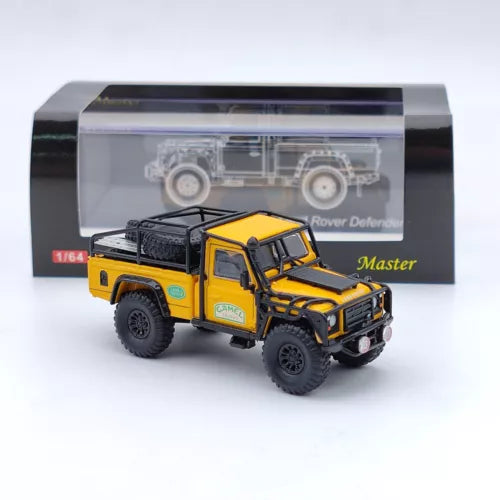 Diecast pickup toy truck, yellow with black grille and rugged tires