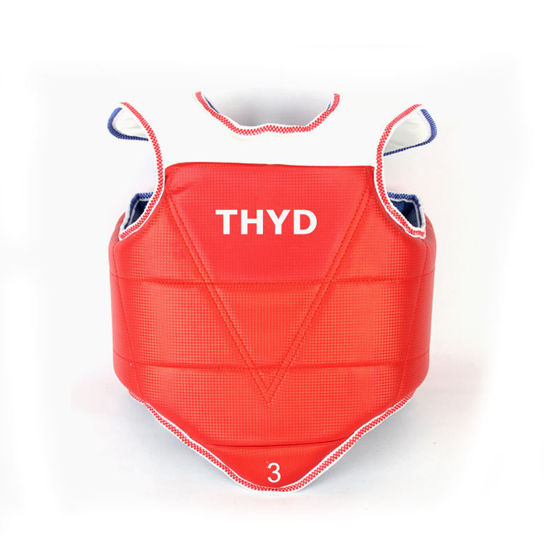 Red taekwondo chest protector with THYD front logo and white trim, blue strap loops
