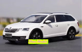 1:18 scale diecast station wagon model car, white with black wheels and grille