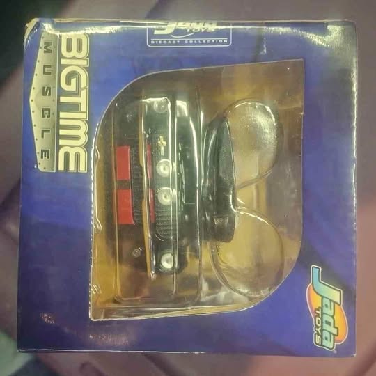 Diecast vehicle model toy in clear blister pack inside blue retail box
