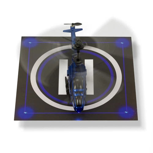 Small drone landing pad with circular target ring and blue light accents