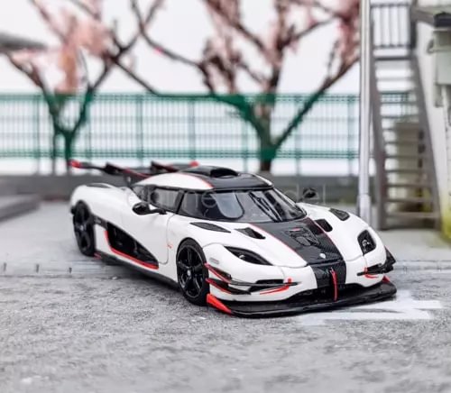 White super racing sports diecast resin model car with black hood and red accents
