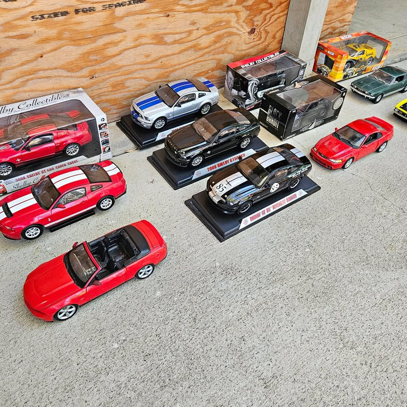 Diecast Mustang and Shelby car models set with red, white, black, blue, green cars