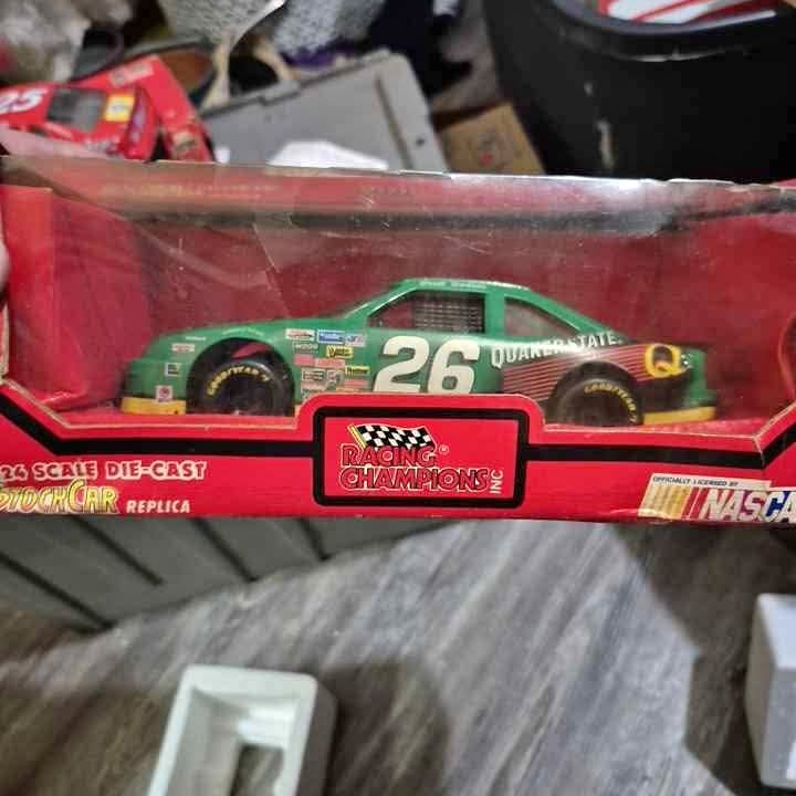 1:24 scale die-cast stock car replica, green #26 in red packaging
