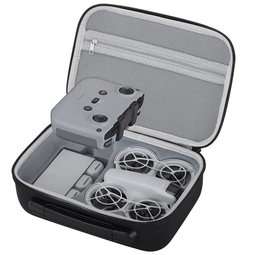 Hard drone carrying case with zipper and foam inserts for controller and prop blades