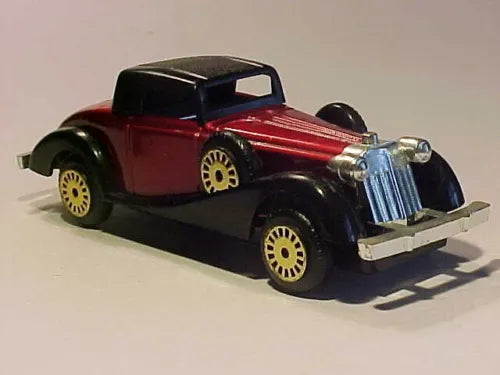 Red and black 1935-style diecast roadster car model with chrome front grille