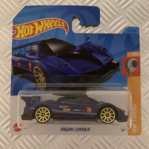 Blue diecast race car in blister pack, black and gold wheels, Pagani Zonda R.