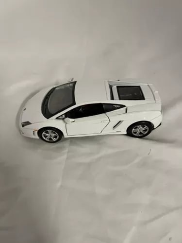 White Lamborghini Gallardo LP560-4 diecast car, side view