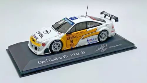 Opel Calibra V6 DTM 1995 diecast race car model, white and yellow with decals