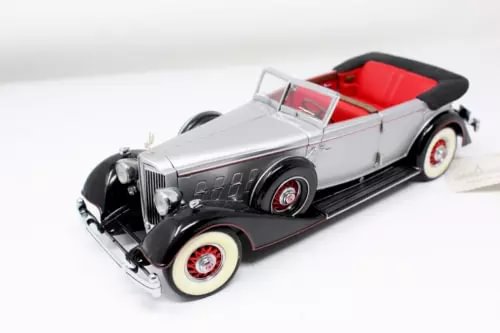1:24 diecast convertible car, silver body with red interior and black fenders