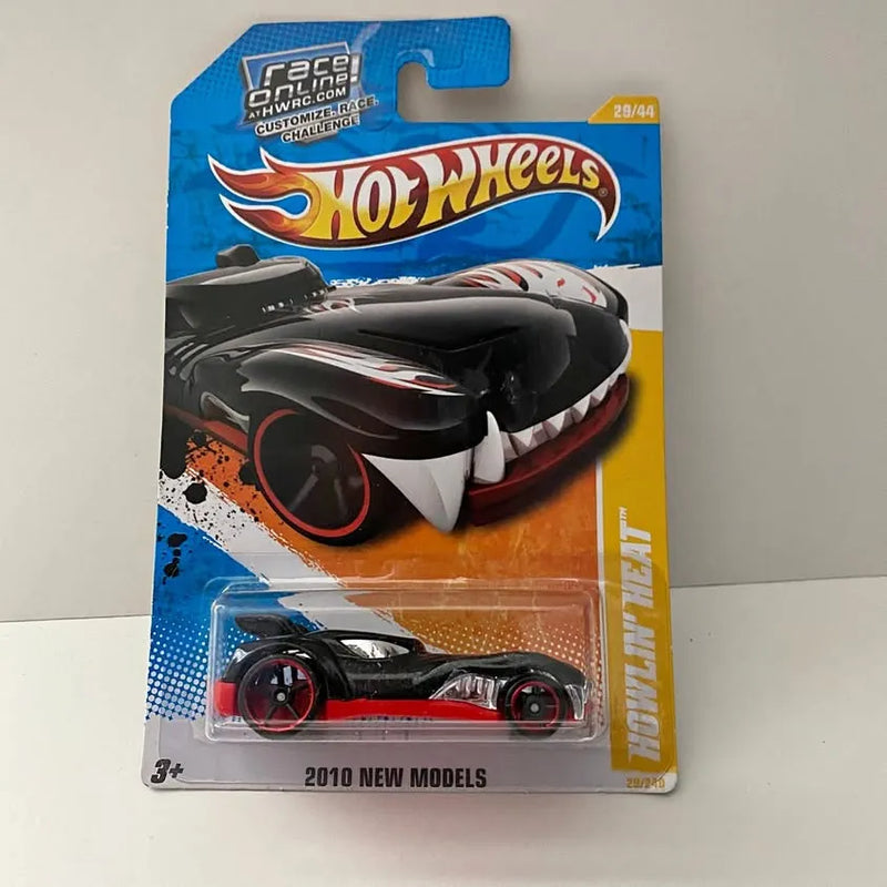 Hot Wheels diecast car in blister pack, black with red flame graphics and silver details