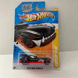 Hot Wheels diecast car in blister pack, black with red flame graphics and silver details